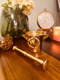Atlas Maple Heritage Brass Mortar and Pestle set, featuring a polished brass mortar with matching pestle for grinding herbs and spices.
