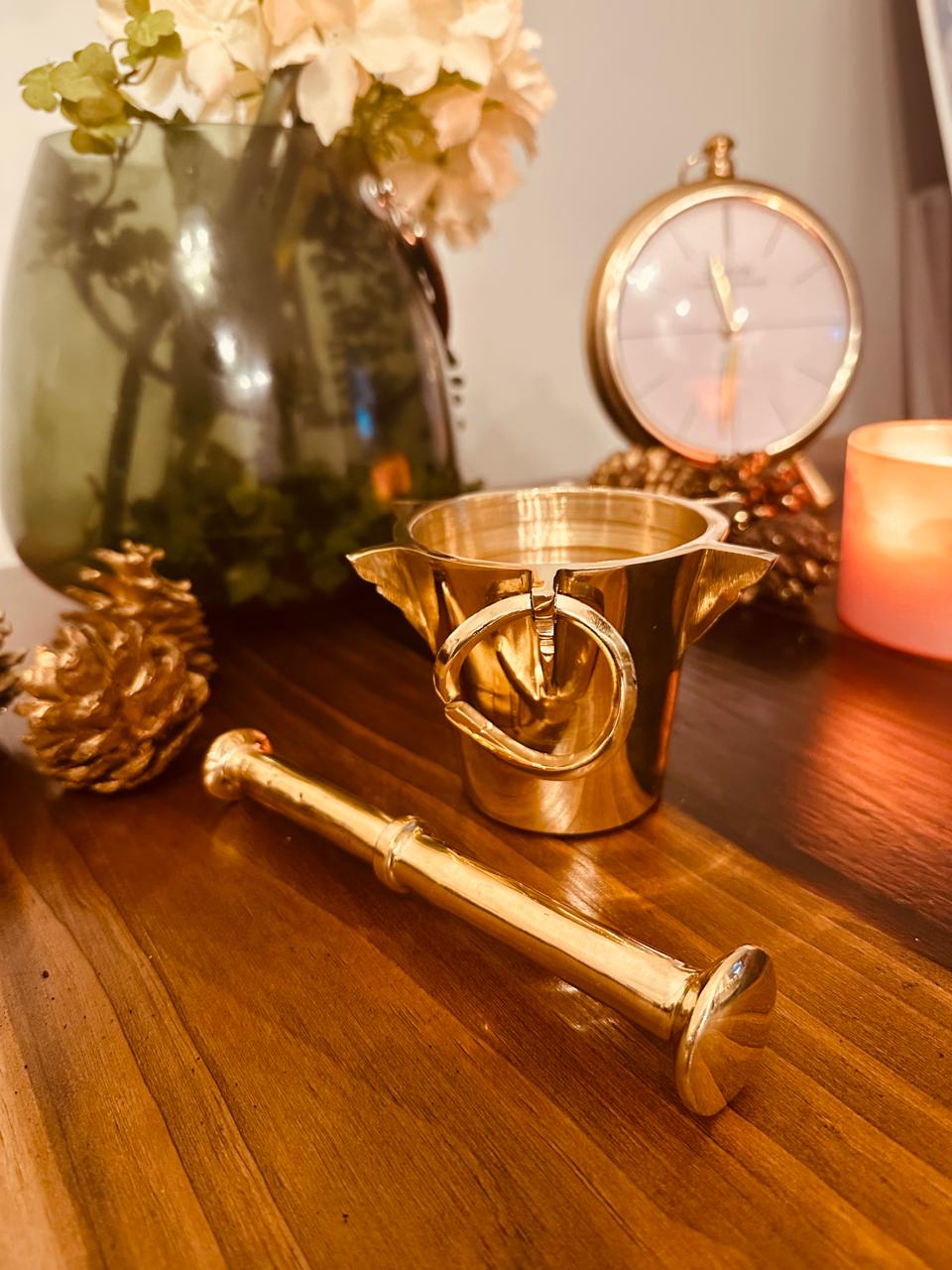 Atlas Maple Heritage Brass Mortar and Pestle set, featuring a polished brass mortar with matching pestle for grinding herbs and spices.