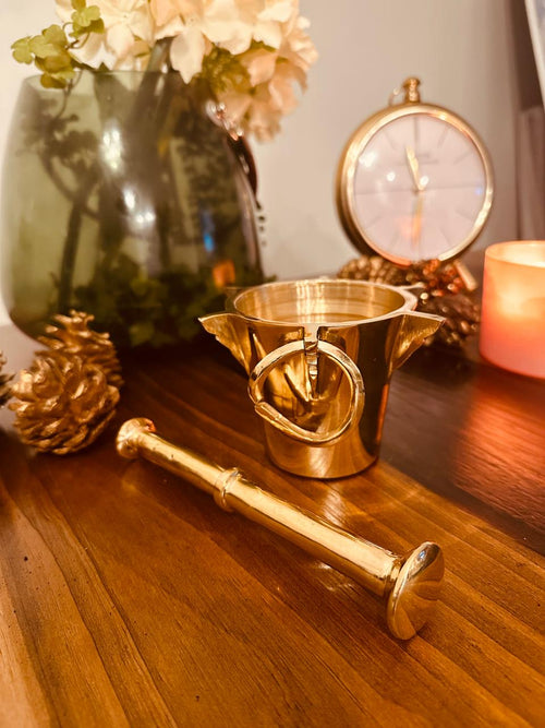 Atlas Maple Heritage Brass Mortar and Pestle set, featuring a polished brass mortar with matching pestle for grinding herbs and spices.