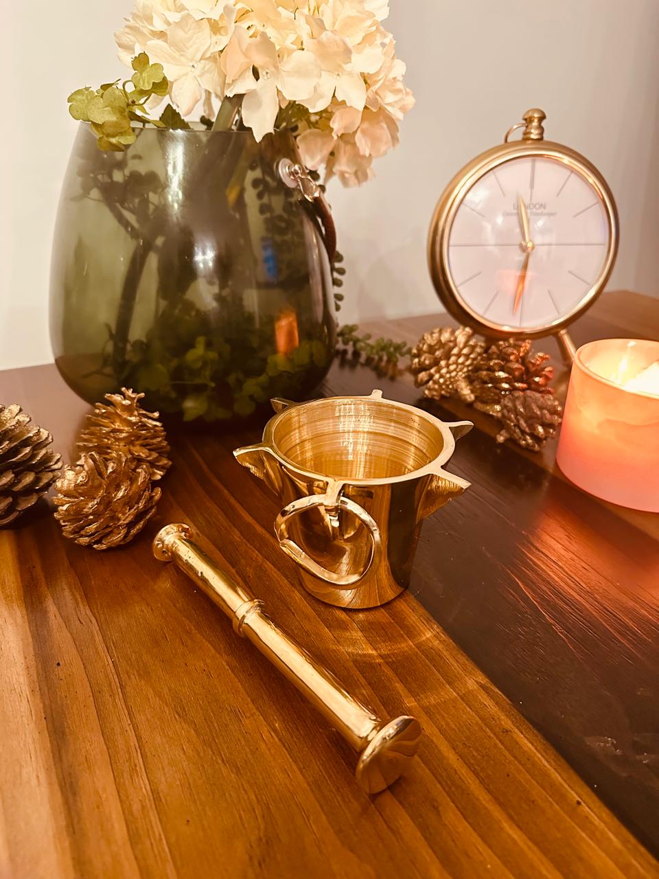 Atlas Maple Heritage Brass Mortar and Pestle set, featuring a sturdy brass mortar with a matching pestle for grinding spices.