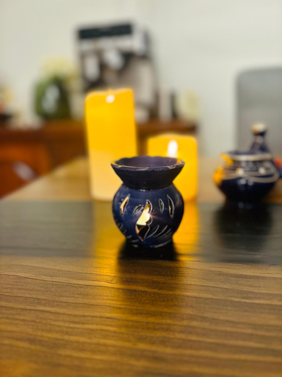 Atlas Maple Ember Glow Diffuser burner with a blue ceramic finish and intricate design, perfect for aromatherapy and home decor.